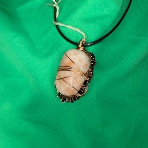 Sunstone in Copper/Black Wire Wrapping